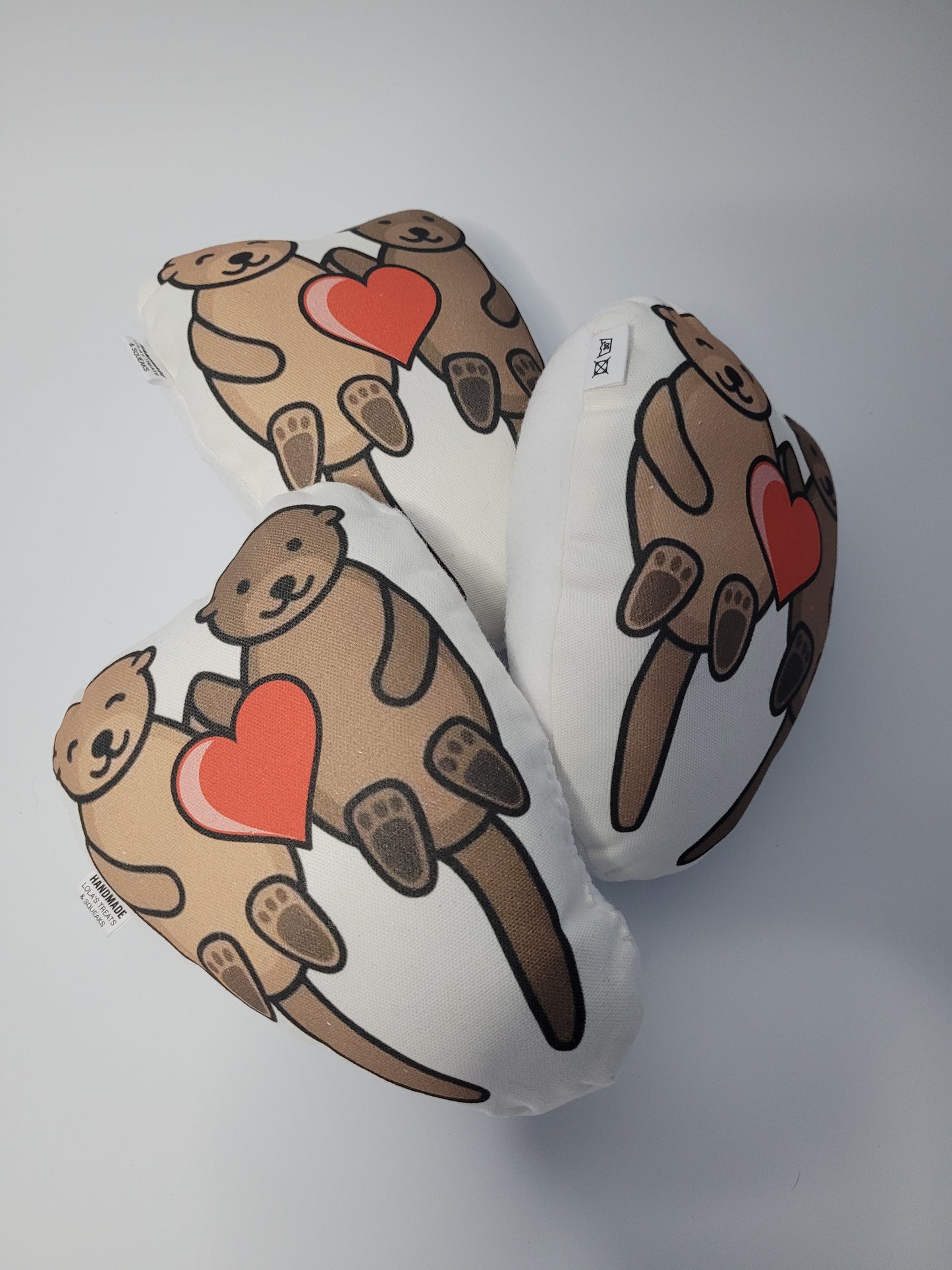 Otterly in love squeaky plush toy