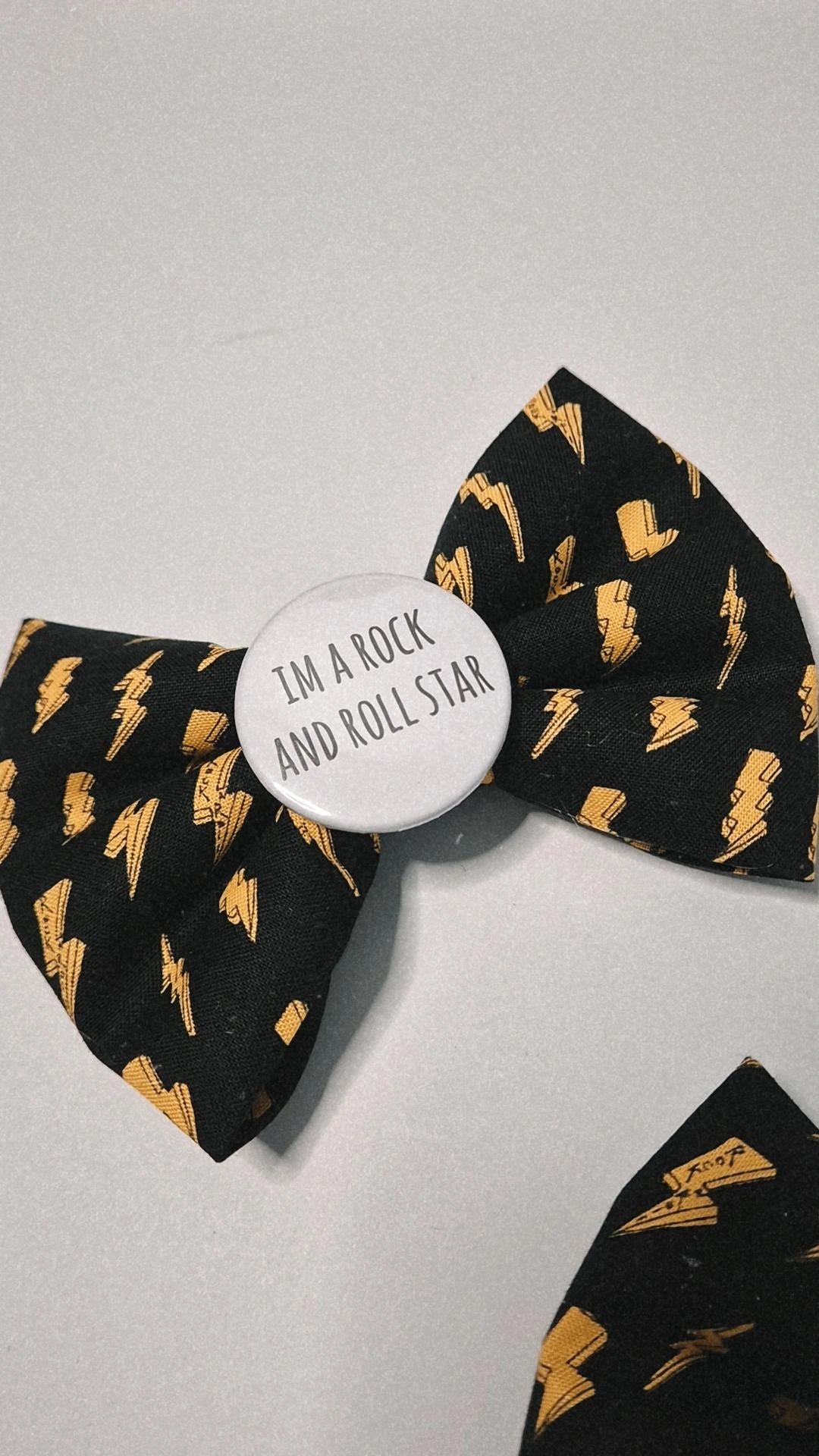 Rock and roll slogan bowtie