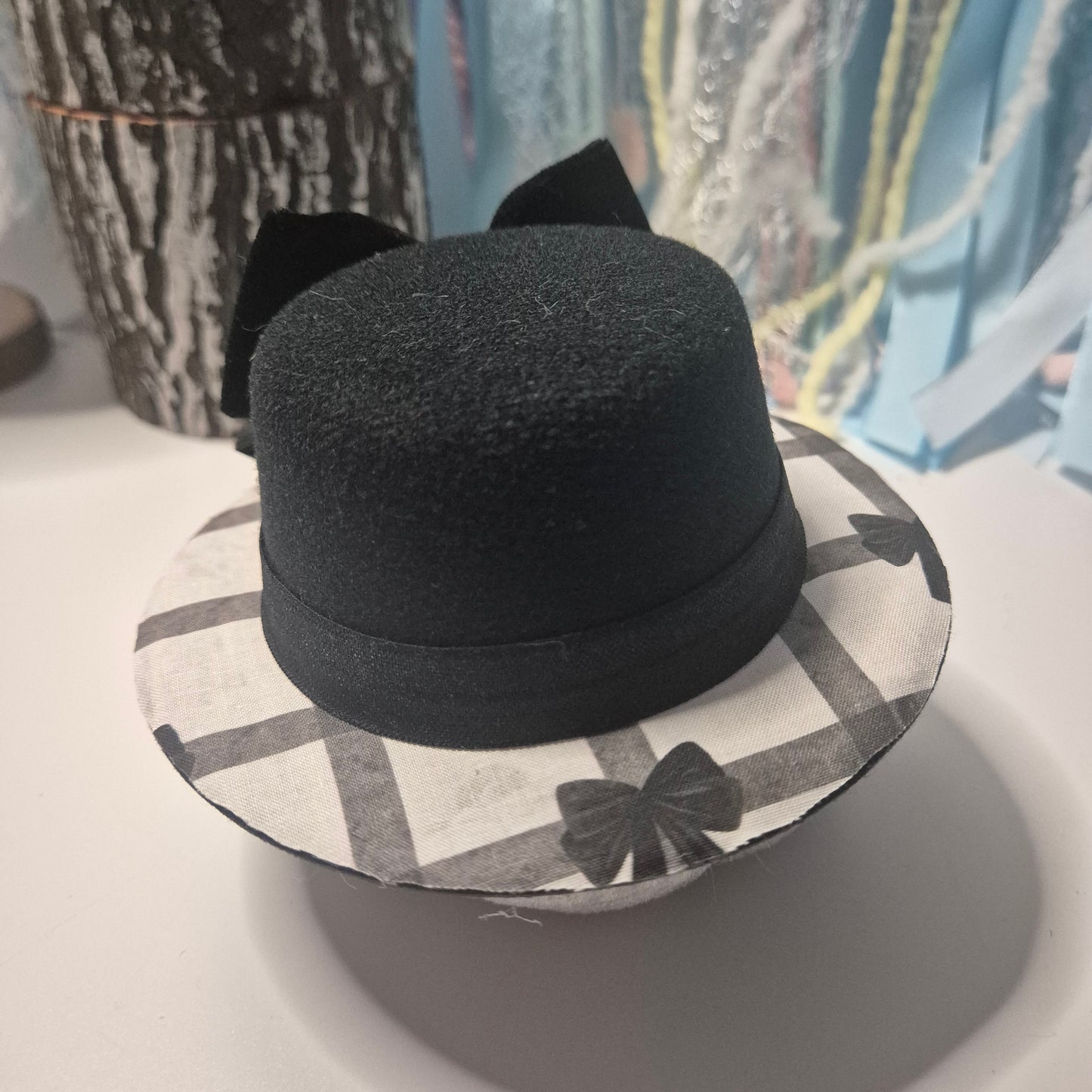 Black bow bowler