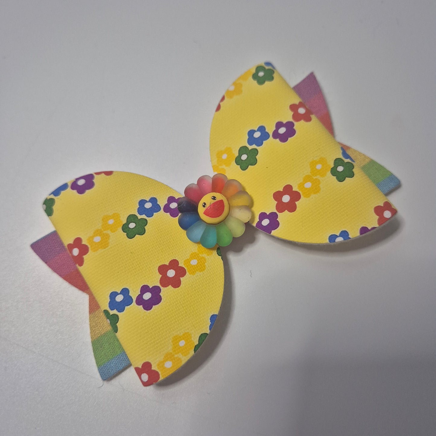Rainbow flower canvas bow