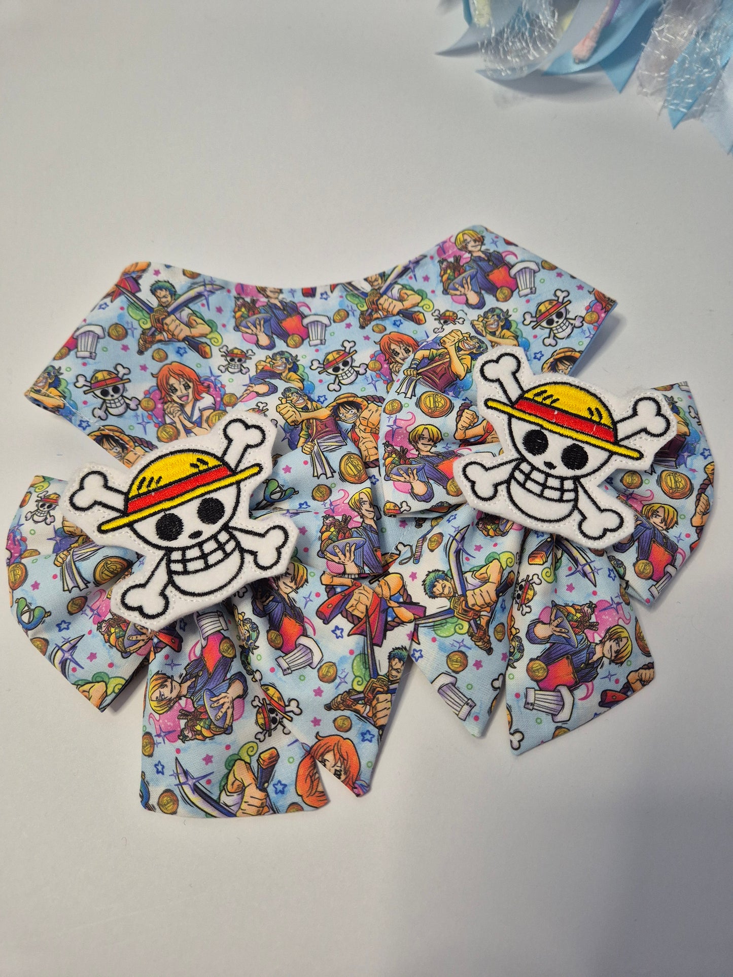 One piece embroidered sailor bow