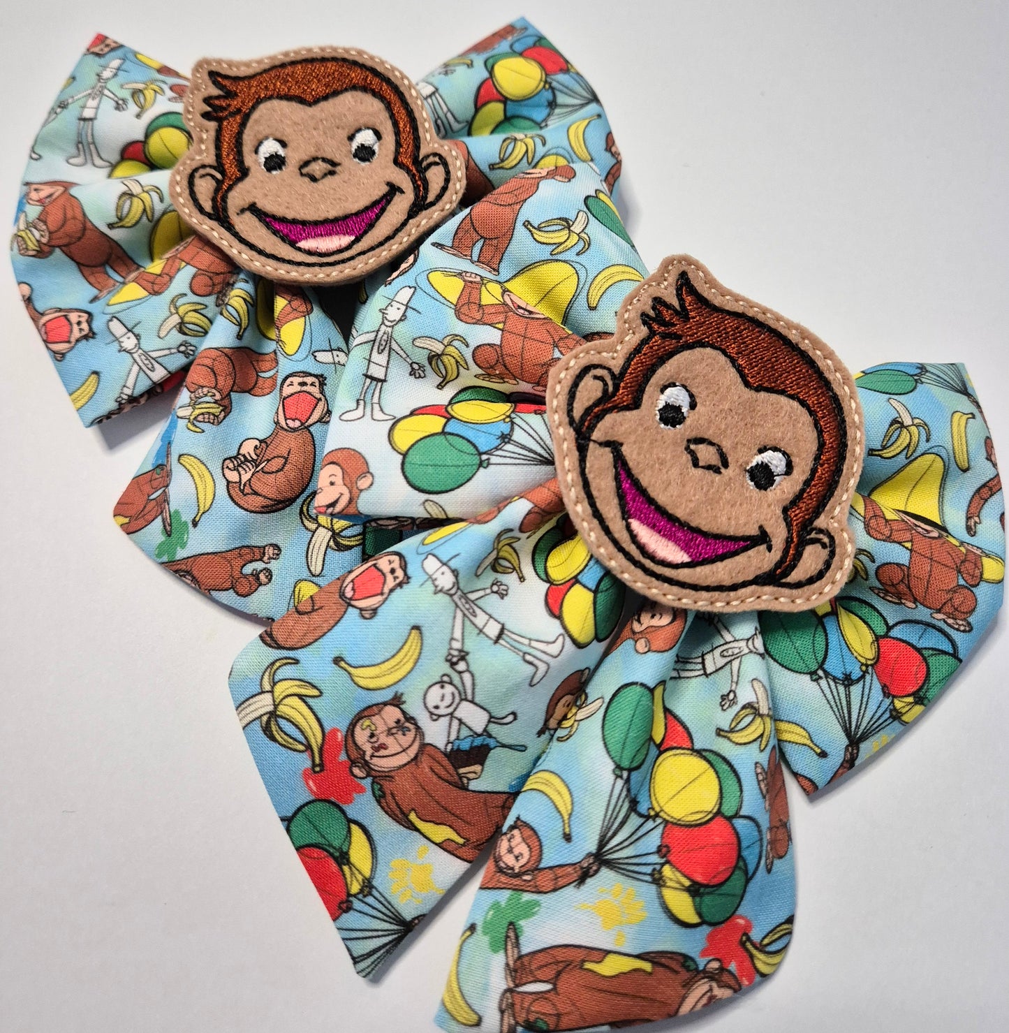 Curious monkey embroidered sailor bow