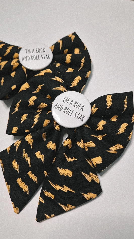 Rock and roll slogan sailor bow
