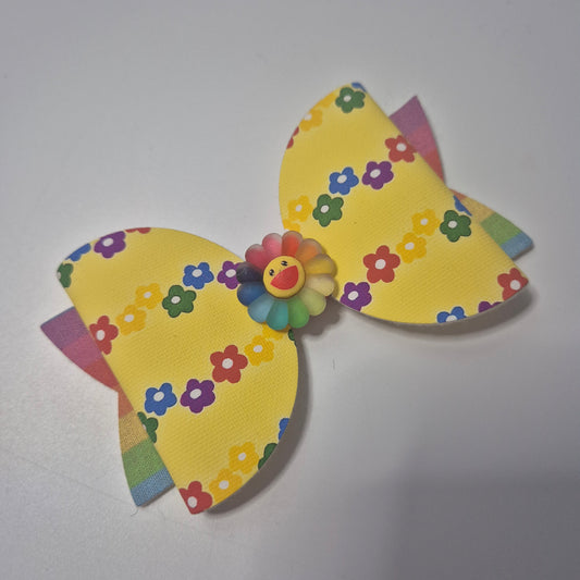 Rainbow flower canvas bow