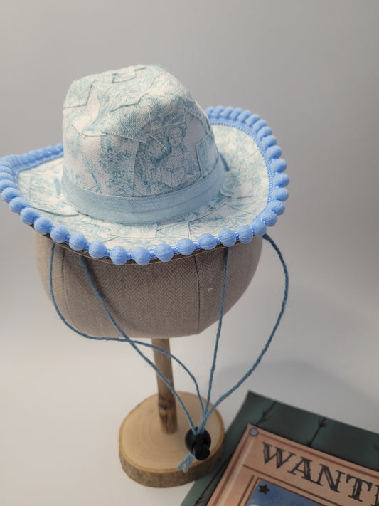 Toile baby blue pom cowboy hat (one available)