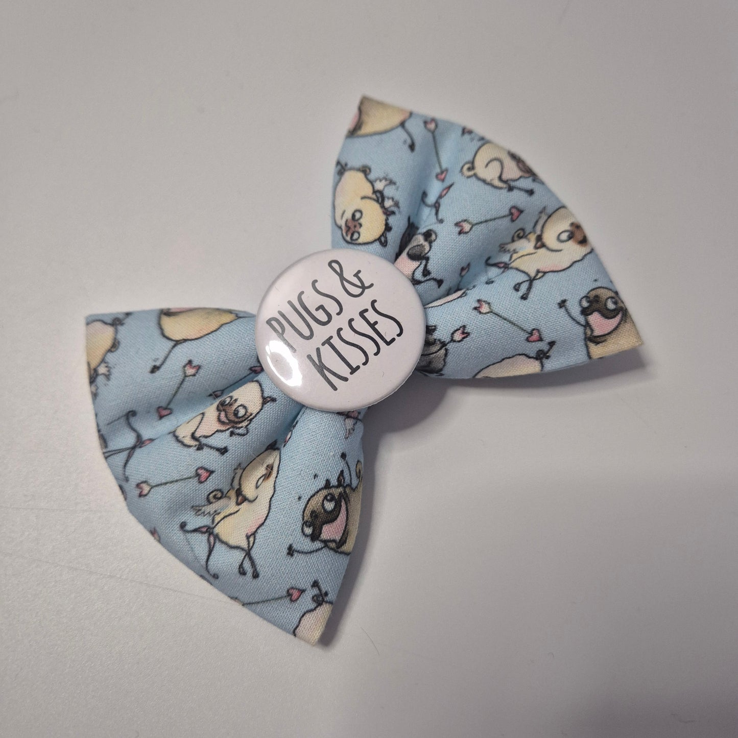 Pugs kisses bowtie