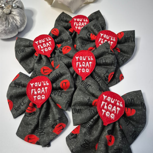 You'll float to embroidered sailor bow
