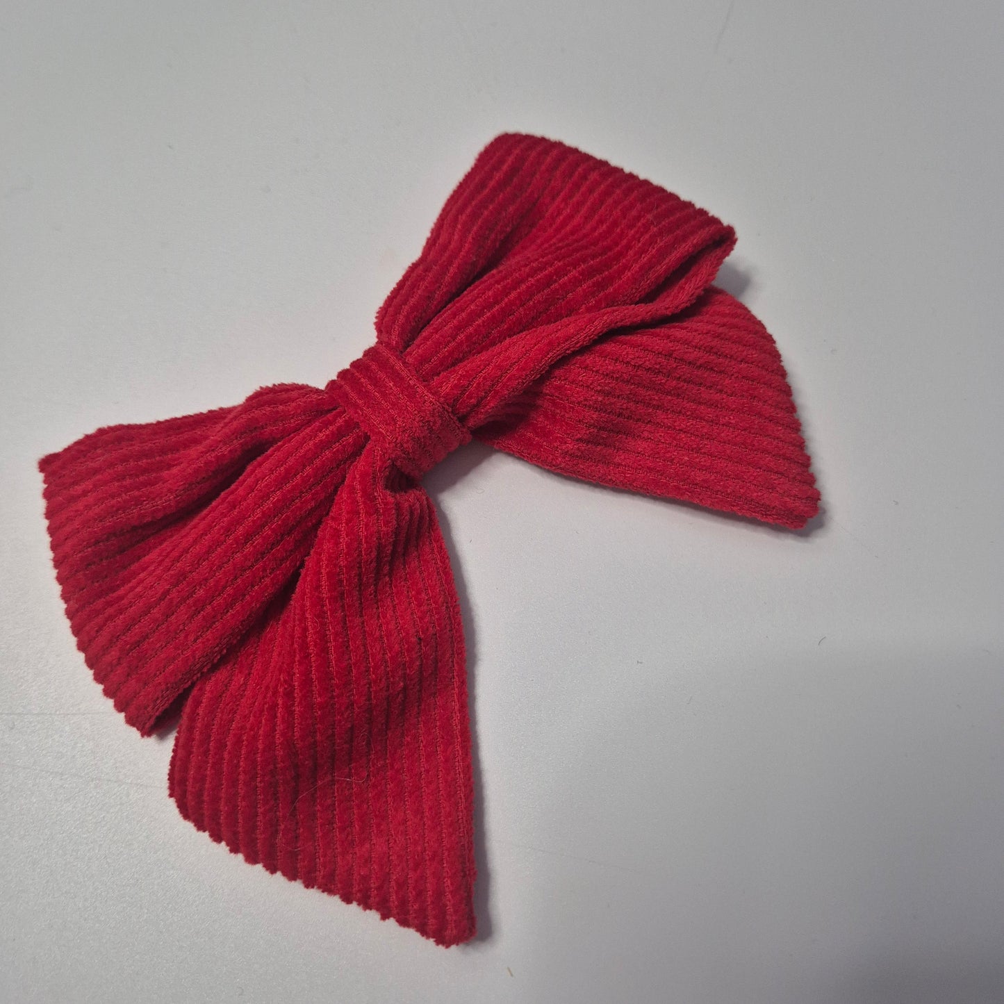 Red cord bow