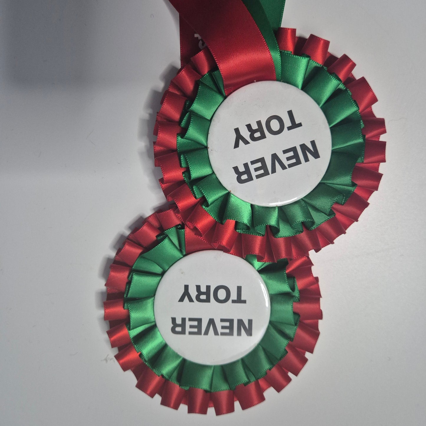 Never tory rossette (seconds tiny rust mark on badge)